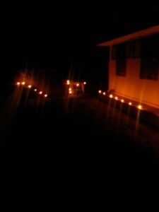 the entire courtyard lit up with diyas